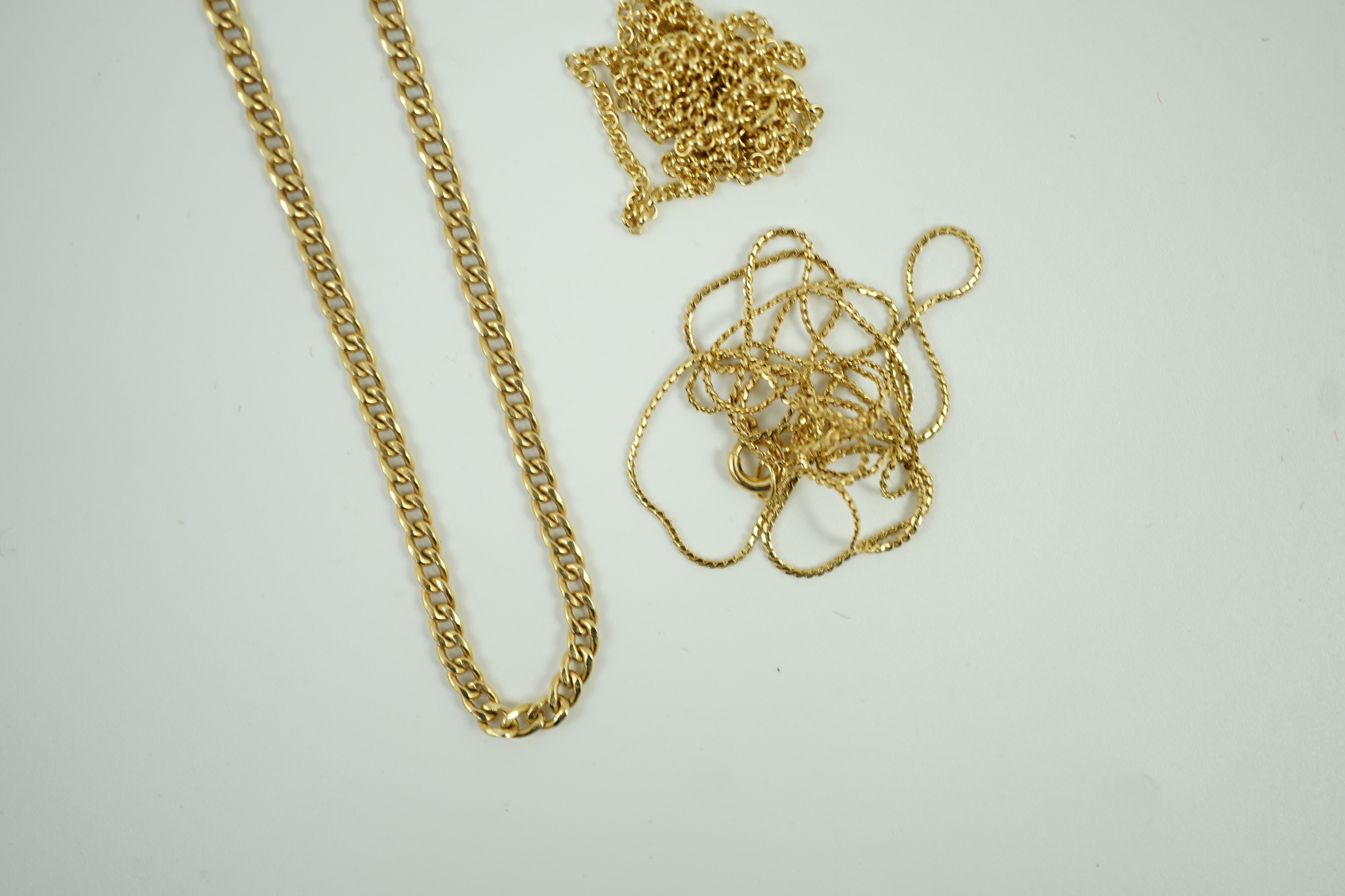 Two modern 9ct gold chains, longest 45cm, 6 grams, a 14kt bracelet, 1.6 grams and a 750 fine link chain, 2.3 grams.